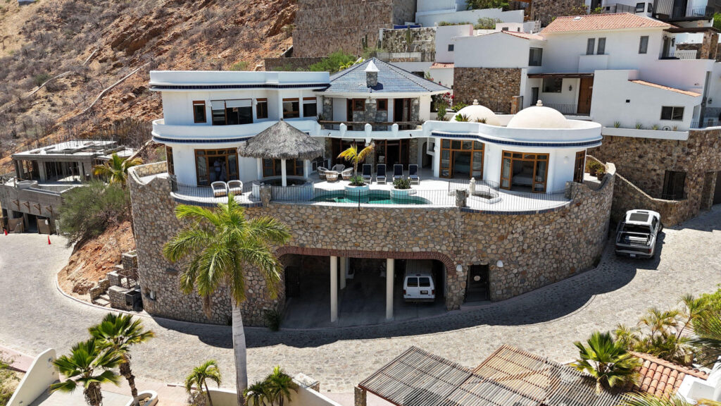 Cabo San Lucas Pedregal Csl Casa Agave presents a rare invitation to experience the raw beauty and vibrant life of the Pacific Ocean from a residence of contemporary distinction. Designed for those who seek both serene sanctuary and moments of shared delight, this seven-bedroom oceanfront home offers an unparalleled connection to the stunning Los Cabos coast.Imagine waking to the sound of waves, the horizon a canvas for breathtaking sunrises. At Casa Agave, the expansive living spaces seamlessly merge with the coastal landscape, offering uninterrupted for sale