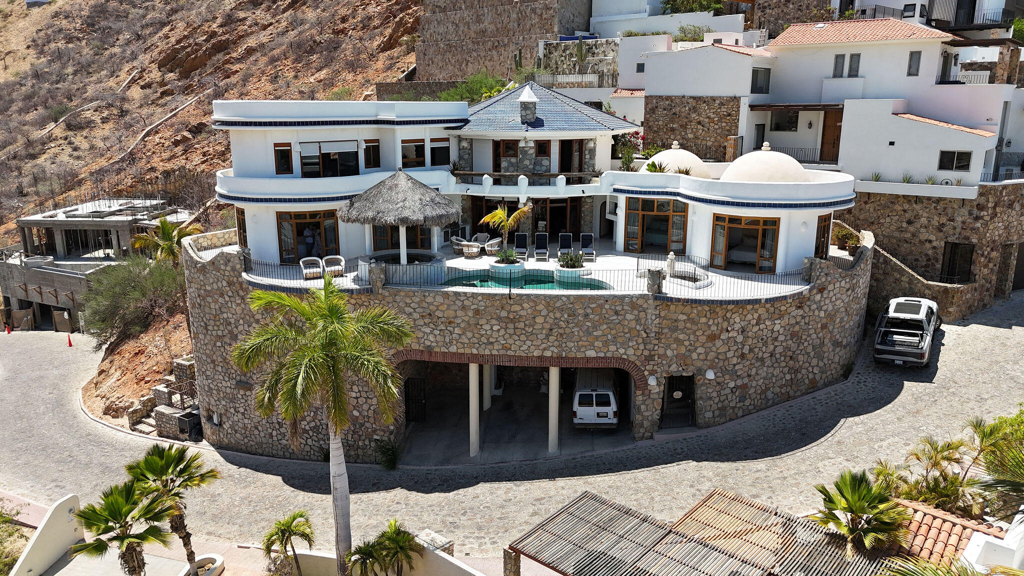 Cabo San Lucas Pedregal Csl Casa Agave presents a rare invitation to experience the raw beauty and vibrant life of the Pacific Ocean from a residence of contemporary distinction. Designed for those who seek both serene sanctuary and moments of shared delight, this seven-bedroom oceanfront home offers an unparalleled connection to the stunning Los Cabos coast.Imagine waking to the sound of waves, the horizon a canvas for breathtaking sunrises. At Casa Agave, the expansive living spaces seamlessly merge with the coastal landscape, offering uninterrupted for sale