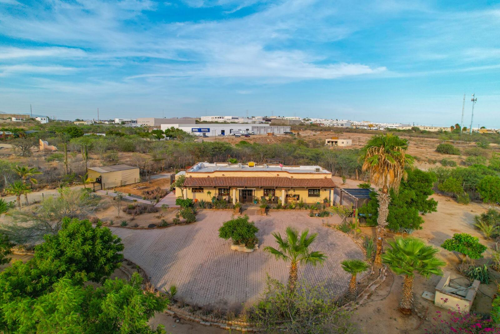 Cabo San Lucas Jacarandas This is ideal for a New owner who wants to stay away from HOA, with over 30,000 sf tq of land and a Cozy Home by now one of the main streets with huge value New Pueblo Bonito Street via jacarandas on the north of Cabo near new plazas and stores.also ideal for a Developer for commercial or Residential projectMotivated for sale