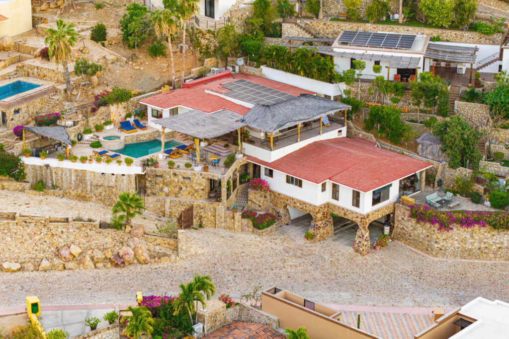 Cabo San Lucas Pedregal Csl Villa Felicidad is a 5-bedroom, 5.5-bath residence in Pedregal that combines scale, location, and proven income potential. Set just minutes from the main gate and within walking distance to the marina, it offers effortless access to Cabo's best dining and nightlife while maintaining privacy. The home features a private pool, expansive terraces, and panoramic marina – 25 Camino Grande Pedregal, Cabo San Lucas, BS